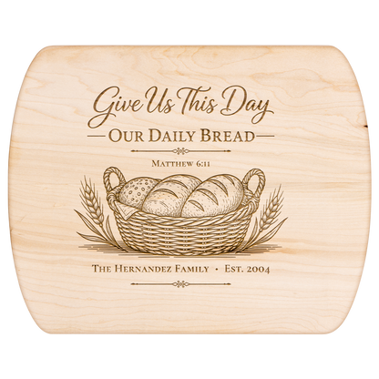 Front view of the Matthew 6:11 board with an engraved bread basket, wheat, and example Hernandez family personalization.