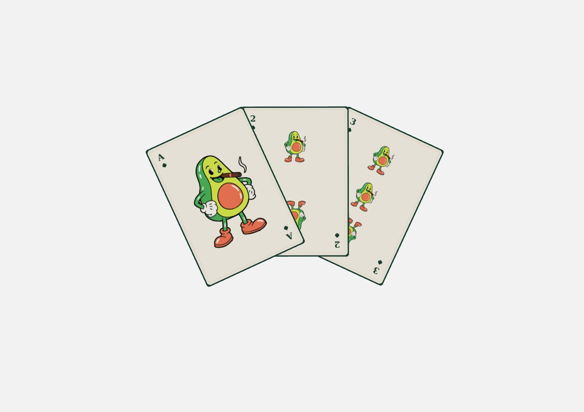 Personalized playing cards with an avocado logo, shown as a Sonora Farms corporate gift example